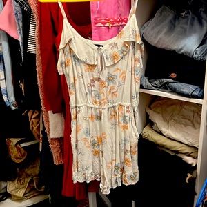 Floral slightly worn romper